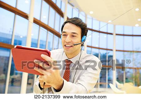 Business man with digital tablet View Large Photo Image Stock Photo - Business man with digital tablet. Fotosearch