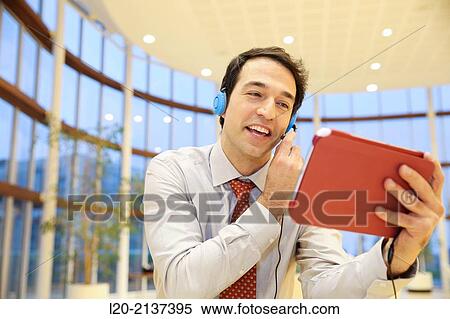 Business man with digital tablet View Large Photo Image Stock Photography - Business man with digital tablet. Fotosearch