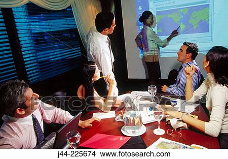 Business people in conference room during presentation View Large Photo Image Picture - Business people in conference room during presentation. Fotosearch