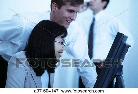 Business people in office View Large Photo Image Stock Photo - Business people in office. Fotosearch