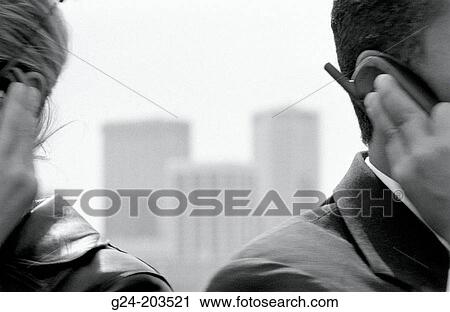 Business people on cell-phones turning View Large Photo Image Stock Image - Business people on cell-phones turning. Fotosearch