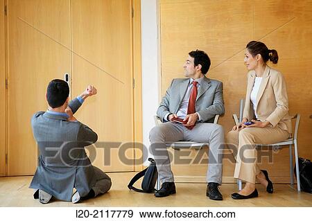 Stock Photo - Business people. Fotosearch