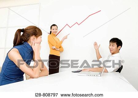 Stock Photo - Business Team talking on stock market. Fotosearch