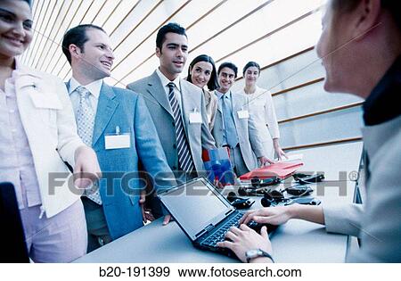 Business trade show, check-in View Large Photo Image Stock Photo - Business trade show, check-in. Fotosearch