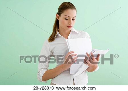 business woman checking document View Large Photo Image Stock Image - business woman checking document. Fotosearch