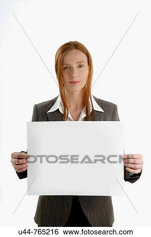 Business Woman holding a white paper View Large Photo Image Stock Photograph - Business Woman holding a white paper. Fotosearch