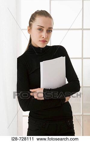 business woman holding documents View Large Photo Image Stock Image - business woman holding documents. Fotosearch