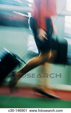 Business woman in a hurry View Large Photo Image Stock Image - Business woman in a hurry. Fotosearch