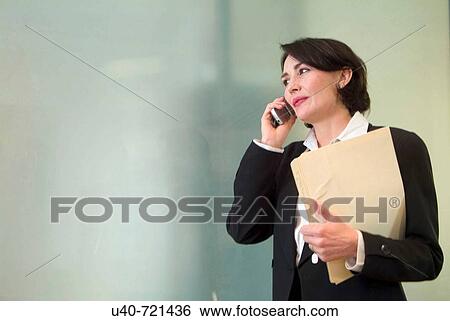 Business woman in office View Large Photo Image Stock Photograph - Business woman in office. Fotosearch