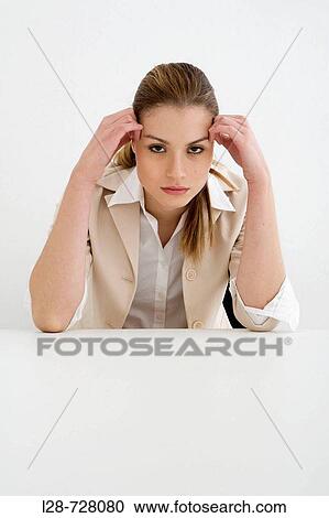 Stock Image - business woman sitting. Fotosearch