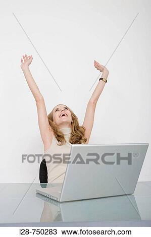 business woman smiling with her hands raised View Large Photo Image Stock Image - business woman smiling with her hands raised. Fotosearch