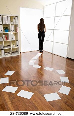 business woman standing behind the shape of question mark View Large Photo Image Stock Photo - business woman standing behind the shape of question mark. Fotosearch