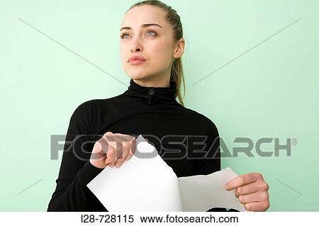 business woman tearing document View Large Photo Image Stock Photography - business woman tearing document. Fotosearch