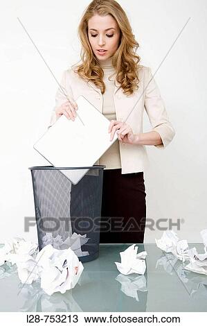 Stock Image - business woman throw computer. Fotosearch