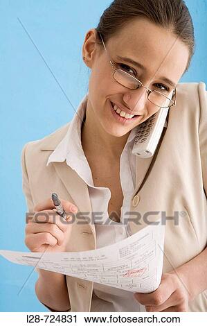 business woman using a phone View Large Photo Image Stock Image - business woman using a phone. Fotosearch