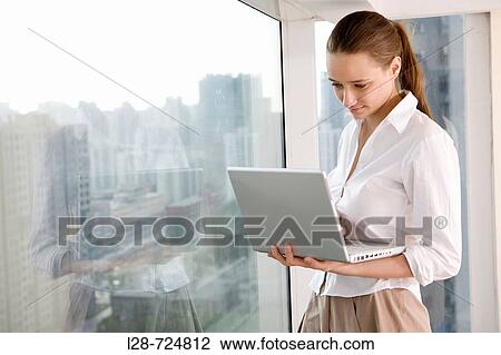 business woman using laptop View Large Photo Image Stock Image - business woman using laptop. Fotosearch