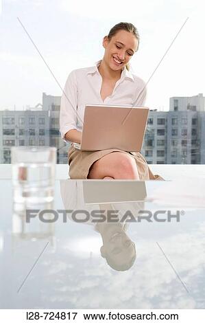 business woman using laptop View Large Photo Image Stock Photo - business woman using laptop. Fotosearch