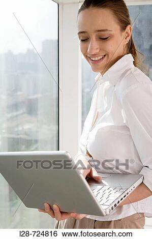 business woman using laptop View Large Photo Image Stock Photograph - business woman using laptop. Fotosearch