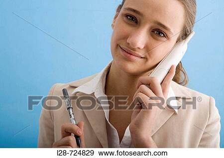 business woman using phone View Large Photo Image Stock Photo - business woman using phone. Fotosearch