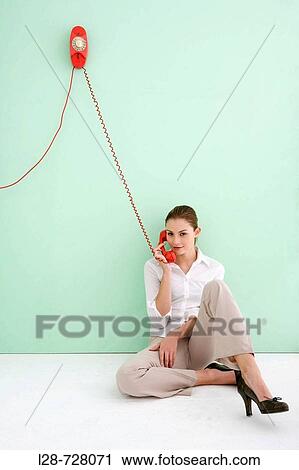 business woman using telephone View Large Photo Image Stock Image - business woman using telephone. Fotosearch