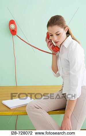 business woman using telephone View Large Photo Image Stock Image - business woman using telephone. Fotosearch