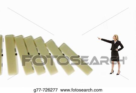 Business woman with domino View Large Photo Image Stock Photo - Business woman with domino. Fotosearch