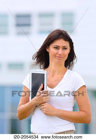 Business woman with tablet in business center. San Sebastian Technology Park. Donostia. Gipuzkoa. Basque Country. Spain. View Large Photo Image Picture - Business woman with tablet in business center. San Sebastian Technology Park. Donostia. Gipuzkoa. Basque Country. Spain.. Fotosearch