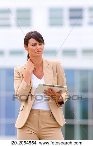 Business woman with tablet in business center. San Sebastian Technology Park. Donostia. Gipuzkoa. Basque Country. Spain. View Large Photo Image Picture - Business woman with tablet in business center. San Sebastian Technology Park. Donostia. Gipuzkoa. Basque Country. Spain.. Fotosearch