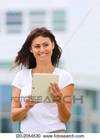 Business woman with tablet in business center. San Sebastian Technology Park. Donostia. Gipuzkoa. Basque Country. Spain. View Large Photo Image Stock Image - Business woman with tablet in business center. San Sebastian Technology Park. Donostia. Gipuzkoa. Basque Country. Spain.. Fotosearch