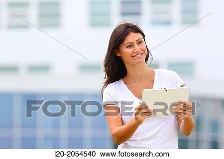 Business woman with tablet in business center. San Sebastian Technology Park. Donostia. Gipuzkoa. Basque Country. Spain. View Large Photo Image Stock Image - Business woman with tablet in business center. San Sebastian Technology Park. Donostia. Gipuzkoa. Basque Country. Spain.. Fotosearch