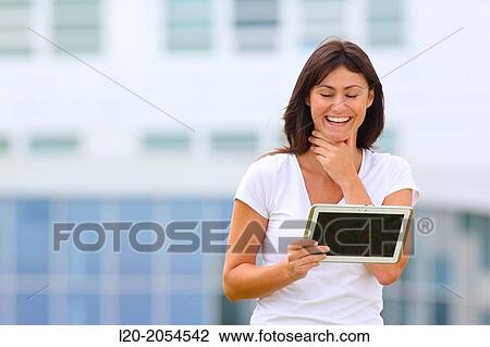 Business woman with tablet in business center. San Sebastian Technology Park. Donostia. Gipuzkoa. Basque Country. Spain. View Large Photo Image Stock Image - Business woman with tablet in business center. San Sebastian Technology Park. Donostia. Gipuzkoa. Basque Country. Spain.. Fotosearch