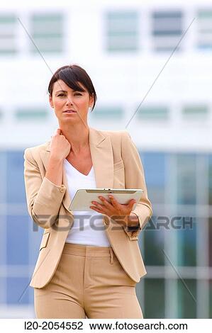 Business woman with tablet in business center. San Sebastian Technology Park. Donostia. Gipuzkoa. Basque Country. Spain. View Large Photo Image Stock Image - Business woman with tablet in business center. San Sebastian Technology Park. Donostia. Gipuzkoa. Basque Country. Spain.. Fotosearch
