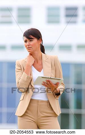 Business woman with tablet in business center. San Sebastian Technology Park. Donostia. Gipuzkoa. Basque Country. Spain. View Large Photo Image Stock Image - Business woman with tablet in business center. San Sebastian Technology Park. Donostia. Gipuzkoa. Basque Country. Spain.. Fotosearch