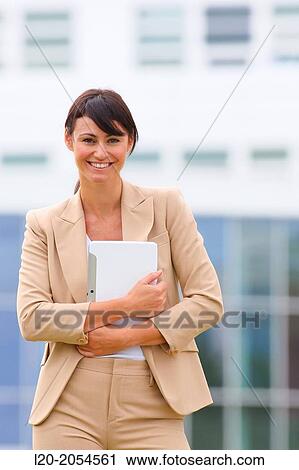 Business woman with tablet in business center. San Sebastian Technology Park. Donostia. Gipuzkoa. Basque Country. Spain. View Large Photo Image Stock Image - Business woman with tablet in business center. San Sebastian Technology Park. Donostia. Gipuzkoa. Basque Country. Spain.. Fotosearch