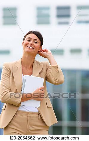 Business woman with tablet in business center. San Sebastian Technology Park. Donostia. Gipuzkoa. Basque Country. Spain. View Large Photo Image Stock Image - Business woman with tablet in business center. San Sebastian Technology Park. Donostia. Gipuzkoa. Basque Country. Spain.. Fotosearch