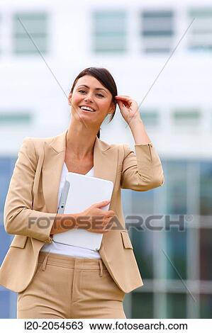 Business woman with tablet in business center. San Sebastian Technology Park. Donostia. Gipuzkoa. Basque Country. Spain. View Large Photo Image Stock Image - Business woman with tablet in business center. San Sebastian Technology Park. Donostia. Gipuzkoa. Basque Country. Spain.. Fotosearch