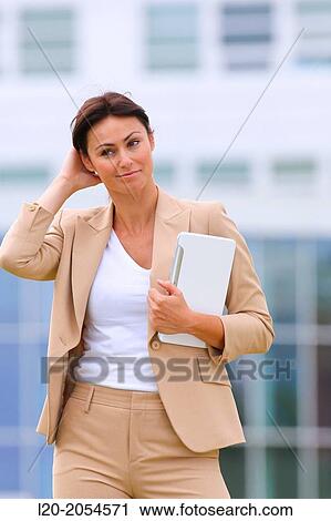 Business woman with tablet in business center. San Sebastian Technology Park. Donostia. Gipuzkoa. Basque Country. Spain. View Large Photo Image Stock Image - Business woman with tablet in business center. San Sebastian Technology Park. Donostia. Gipuzkoa. Basque Country. Spain.. Fotosearch
