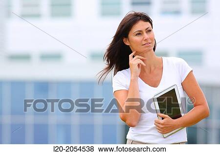 Business woman with tablet in business center. San Sebastian Technology Park. Donostia. Gipuzkoa. Basque Country. Spain. View Large Photo Image Stock Photo - Business woman with tablet in business center. San Sebastian Technology Park. Donostia. Gipuzkoa. Basque Country. Spain.. Fotosearch