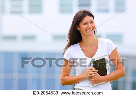 Business woman with tablet in business center. San Sebastian Technology Park. Donostia. Gipuzkoa. Basque Country. Spain. View Large Photo Image Stock Photo - Business woman with tablet in business center. San Sebastian Technology Park. Donostia. Gipuzkoa. Basque Country. Spain.. Fotosearch