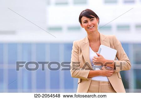 Business woman with tablet in business center. San Sebastian Technology Park. Donostia. Gipuzkoa. Basque Country. Spain. View Large Photo Image Stock Photo - Business woman with tablet in business center. San Sebastian Technology Park. Donostia. Gipuzkoa. Basque Country. Spain.. Fotosearch