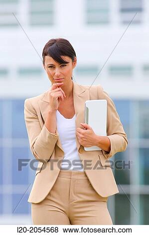 Business woman with tablet in business center. San Sebastian Technology Park. Donostia. Gipuzkoa. Basque Country. Spain. View Large Photo Image Stock Photo - Business woman with tablet in business center. San Sebastian Technology Park. Donostia. Gipuzkoa. Basque Country. Spain.. Fotosearch