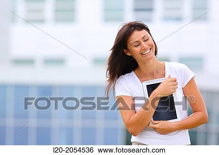 Business woman with tablet in business center. San Sebastian Technology Park. Donostia. Gipuzkoa. Basque Country. Spain. View Large Photo Image Stock Photograph - Business woman with tablet in business center. San Sebastian Technology Park. Donostia. Gipuzkoa. Basque Country. Spain.. Fotosearch