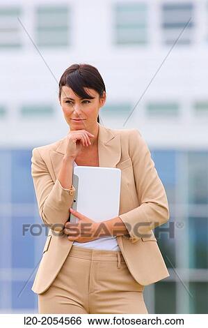 Business woman with tablet in business center. San Sebastian Technology Park. Donostia. Gipuzkoa. Basque Country. Spain. View Large Photo Image Stock Photograph - Business woman with tablet in business center. San Sebastian Technology Park. Donostia. Gipuzkoa. Basque Country. Spain.. Fotosearch