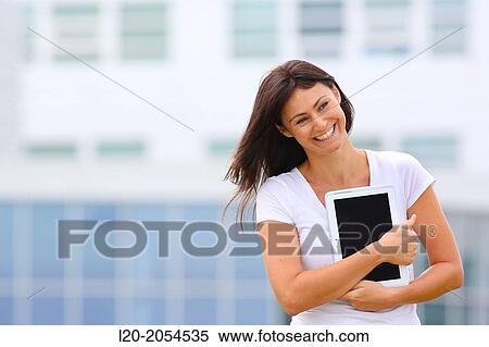 Business woman with tablet in business center. San Sebastian Technology Park. Donostia. Gipuzkoa. Basque Country. Spain. View Large Photo Image Stock Photography - Business woman with tablet in business center. San Sebastian Technology Park. Donostia. Gipuzkoa. Basque Country. Spain.. Fotosearch