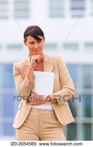 Business woman with tablet in business center. San Sebastian Technology Park. Donostia. Gipuzkoa. Basque Country. Spain. View Large Photo Image Stock Photography - Business woman with tablet in business center. San Sebastian Technology Park. Donostia. Gipuzkoa. Basque Country. Spain.. Fotosearch
