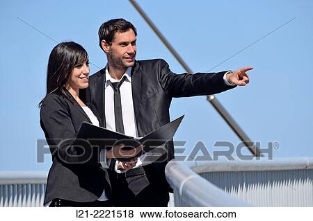 Businessman and businesswoman outdoors. View Large Photo Image Stock Photo - Businessman and businesswoman outdoors.. Fotosearch