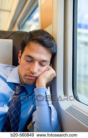 Businessman asleep. Passenger. AVE, Tren de Alta Velocidad, Zaragoza, Arag? n. Spain. View Large Photo Image Stock Photo - Businessman asleep. Passenger. AVE, Tren de Alta Velocidad, Zaragoza, Arag? n. Spain.. Fotosearch