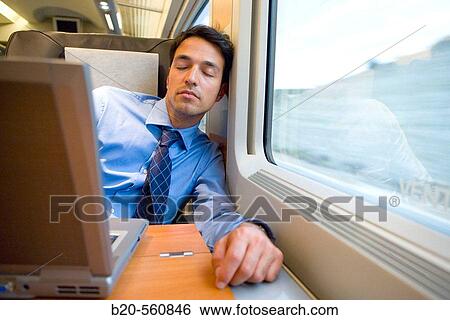 Businessman asleep. Passenger. AVE, Tren de Alta Velocidad, Zaragoza, Arag? n. Spain. View Large Photo Image Stock Photograph - Businessman asleep. Passenger. AVE, Tren de Alta Velocidad, Zaragoza, Arag? n. Spain.. Fotosearch