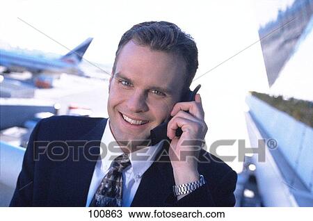 Businessman at the airport View Large Photo Image Stock Image - Businessman at the airport. Fotosearch