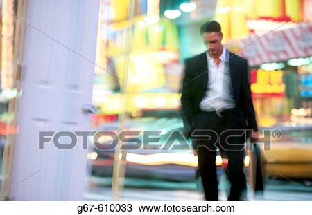 Stock Image - Businessman at Times Square. New York City. USA. Fotosearch